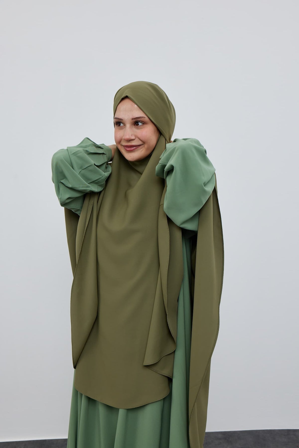 Circular French Khimar – olive, front view on model