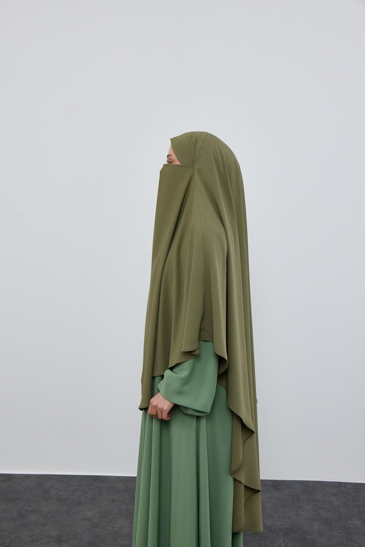 Circular French Khimar – olive, side view on model
